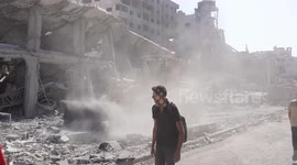 Palestinians return to ruined homes in Gaza City after deadly Israeli assault (3)