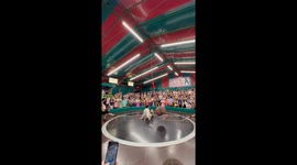Traditional Oktoberfest game sees contestant evade lassos on spinning floor