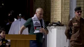 Iraqis rally at Baghdad mosque in support of Palestinians as Gaza ceasefire begins