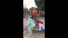 Girl crushes friend’s sandcastle while playing in Volgograd, Russia