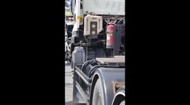 Traffic cops remove huge python stuck under truck