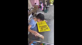 Fly trap paper blows into boy’s face in Anhui, China