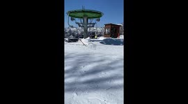 Couples lose balance getting off ski lift in Shandong, China