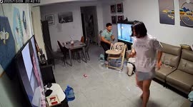 Mother screams as fish leaps from tank onto sofa