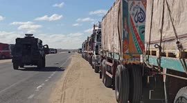 Aid trucks prepare to move from Egypt to Gaza after ceasefire