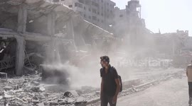 Palestinians return to ruined homes in Gaza City after deadly Israeli assault (3)