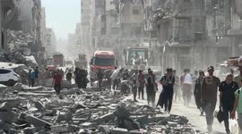 Palestinians return to ruined homes in Gaza City after deadly Israeli assault