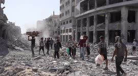 Palestinians return to ruined homes in Gaza City after deadly Israeli assault (2)