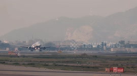 A Ryanair airplane coming into land at barcelona airport in spain