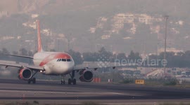 An Easyjet airplane on the runway barcelona airport in spain