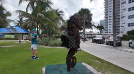 US: Swimmers enjoy themselves and stroll along Pompano Beach