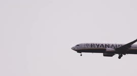 A Ryanair airplanecoming into land at the terminal of barcelona airport in spain