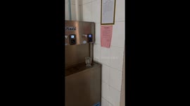 Automatic hot water dispenser causes funny spill in Shanxi, China