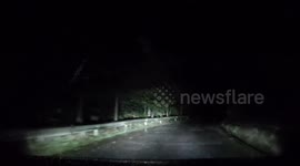 Car overturns after missing road edge while driving at night in Sichuan, China