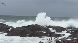 Fierce winds and crashing waves lash coastline in Ogunquit, Maine, USA