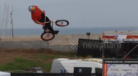 BMX rider doing amazing tricks during extreme barcelona 2024