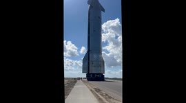 Walk with Starship 38 as it is rolled out from Starbase prior to Flight 11 in the Starship programme.