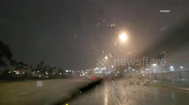 US, Los Angeles: Wilmington Harbor Freeway Driving Heavy Rain