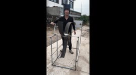 Man demonstrates homemade slap machine invention in Hebei, China