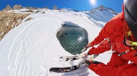 Pro Skier Falls Into Frozen Lake