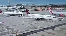 Boeing 737 crashes into two jets parked at airport in Canada