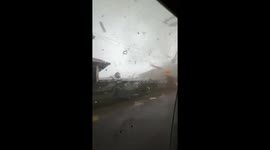Freak tornado tears roofs from buildings in Malaysia
