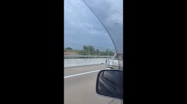 Motorist seen driving car with no doors and bumper