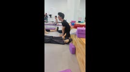 Male ballet dancer cries while trying to do the splits