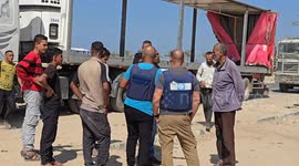 Trucks carrying humanitarian aid enter Gaza following ceasefire
