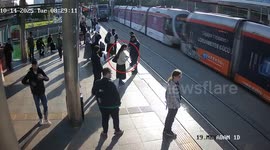 Woman barely escapes tram accident thanks to quick-acting security officer