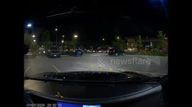 Dashcam Captures Motorcyclist Flying Into Car