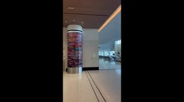 Travelers unfazed during fire alarm at San Diego International Airport, California, USA