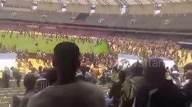 Police fire tear gas at mourners running into stadium in Kenya