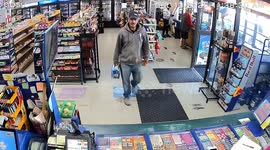 Car crashes through gas station front - narrowly missing customer