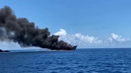 Boat carrying fuel catches fire while sailing between islands in Indonesia