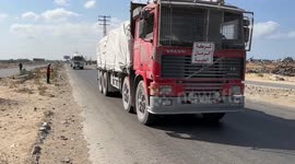 Aid trucks arrive at World Central Kitchen in central Gaza following ceasefire deal