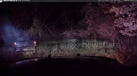 Suspect Flees Burning Truck That Rolls Into Patrol Car