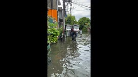 Lifted Autorickshaw Drives Through Floodwater