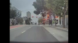 Car Runs Redlight and Has a Close Call With Crossing Pedestrian