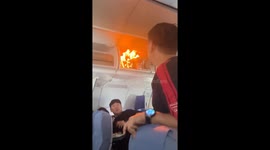 Battery explosion sparks fire inside cabin on Air China flight