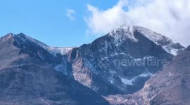 Stunning view of clouds and alpine beauty over Longs Peak, Colorado, USA