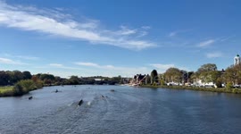 Rowers glide along the Charles River in Cambridge, Massachusetts, USA