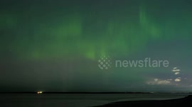 TIMELAPSE - Northern lights dazzle night sky over Anchorage, Alaska