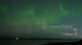 US: TIMELAPSE - Northern lights dazzle night sky over Anchorage, Alaska