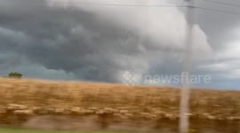 Massive rotating wall cloud looms over Nappanee, Indiana, during severe storms