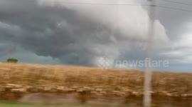 Massive wall cloud rolls across the Indiana countryside, USA