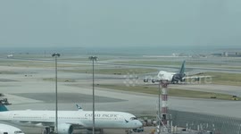 Two dead after cargo plane overshoots runway at Hong Kong Airport