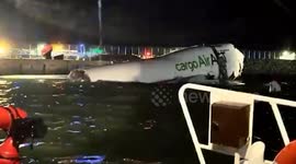 Emirates Boeing 747 cargo plane overshoots runway killing two ground workers in Hong Kong