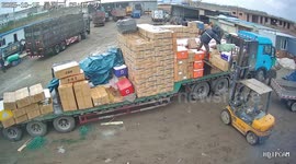 Bungling delivery worker hits colleague while throwing package