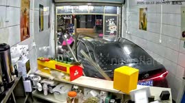New driver crashes into drinks shop in China, knocking down customer
